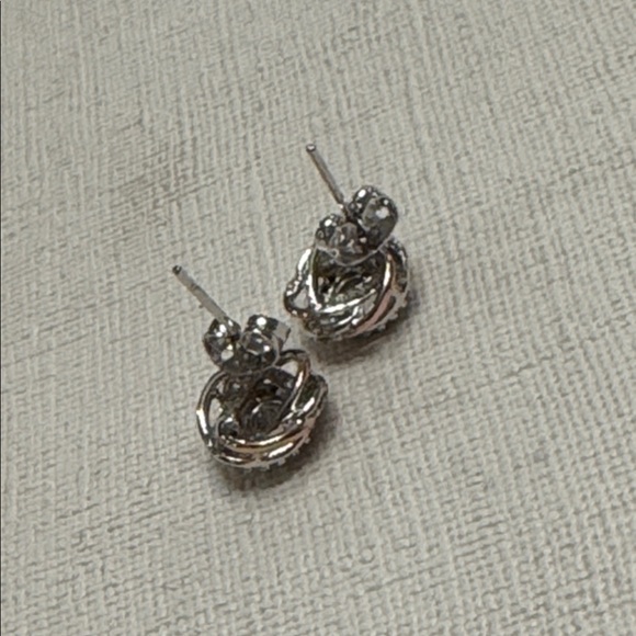 BELLA LUCE White Cubic Zirconia Rhodium 18k
Rose Gold Over Bronze Stud Earrings - Picture 4 of 4